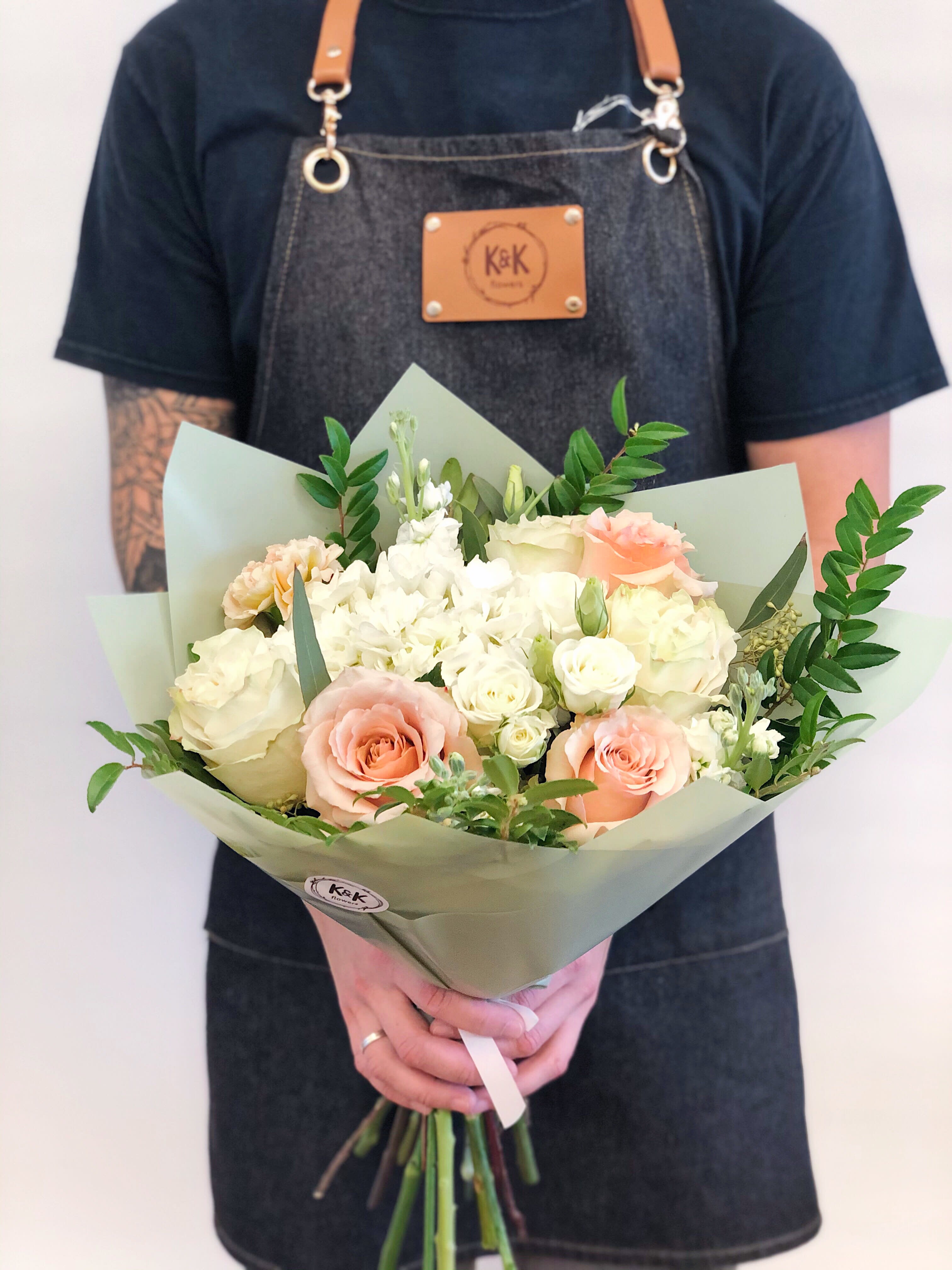 Small Bouquet Peach and White  - Mixed flowers bouquet, from romantic and gentle to an edgy and interesting look. All bouquets come without a vase. You can choose a vase in the add-on section.  Note: Flower food, transportation bag, and flower care instructions are included 