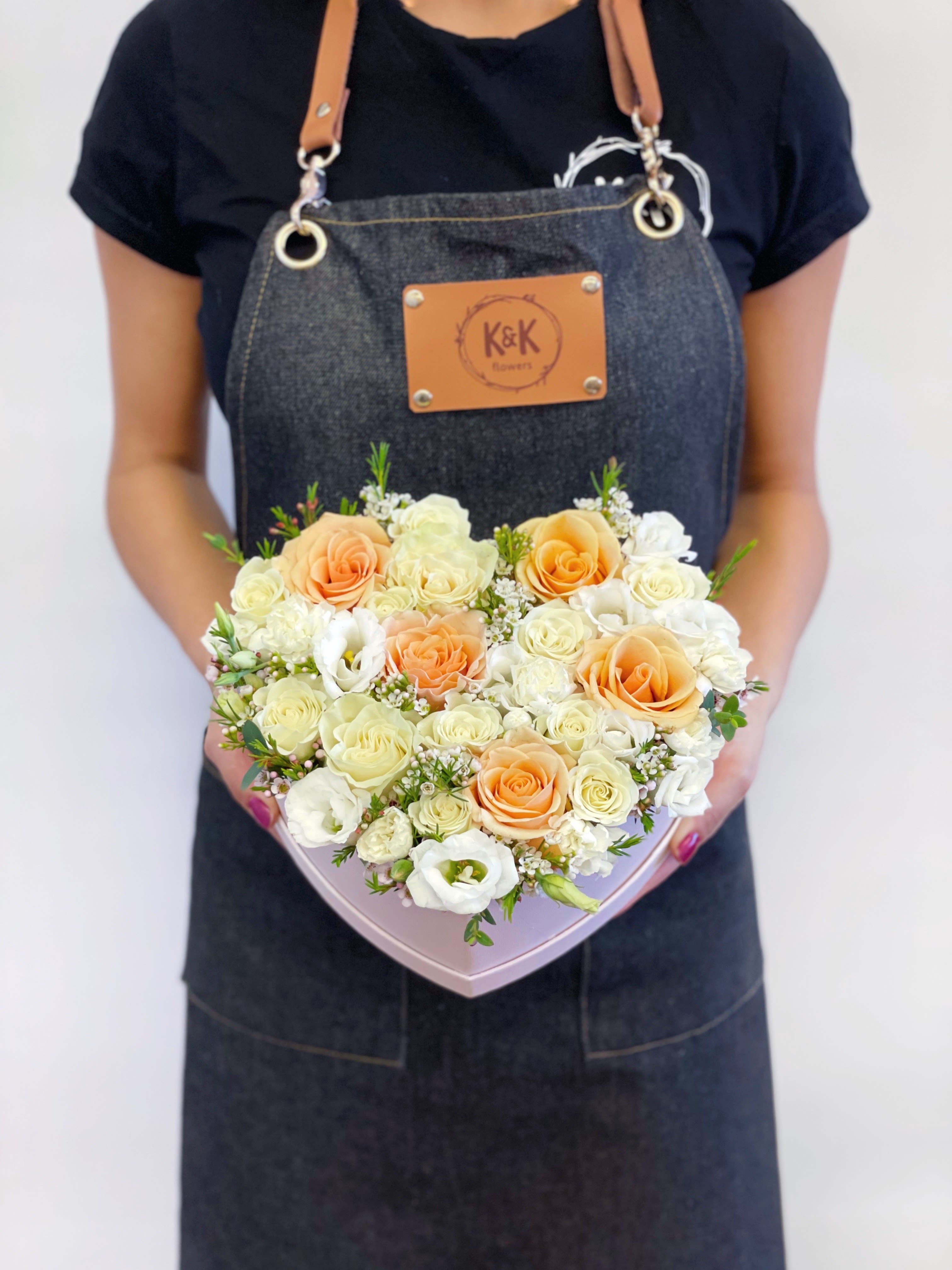 Heart Arrangement Peach and White - If You want bouquet with a twist, choose our flower boxes. We have wood boxes for rustic looking arrangements, or hat boxes for a more elegant look. It’s a beautiful and convenient way. Flowers in boxes don’t need vases. That makes it perfect for transportation and keeping flowers hydrated and secure.