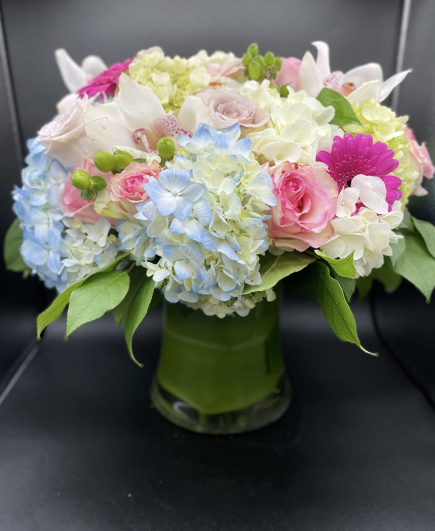 Flawless Beauty - This cylindrical vase of flowers is kind of like a time capsule, if time were made of flowers. What a wonderful “time” that would be.