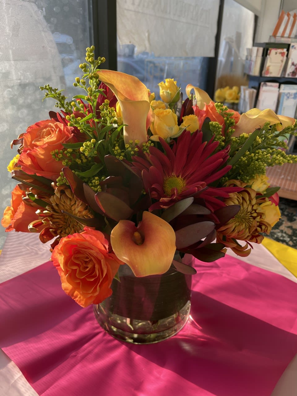 Fall-in-a-Round - Beautiful Fall Vase arrangement in 6X6 Glass Vase Standing about 12-14 inches tall X 12 inches Wide