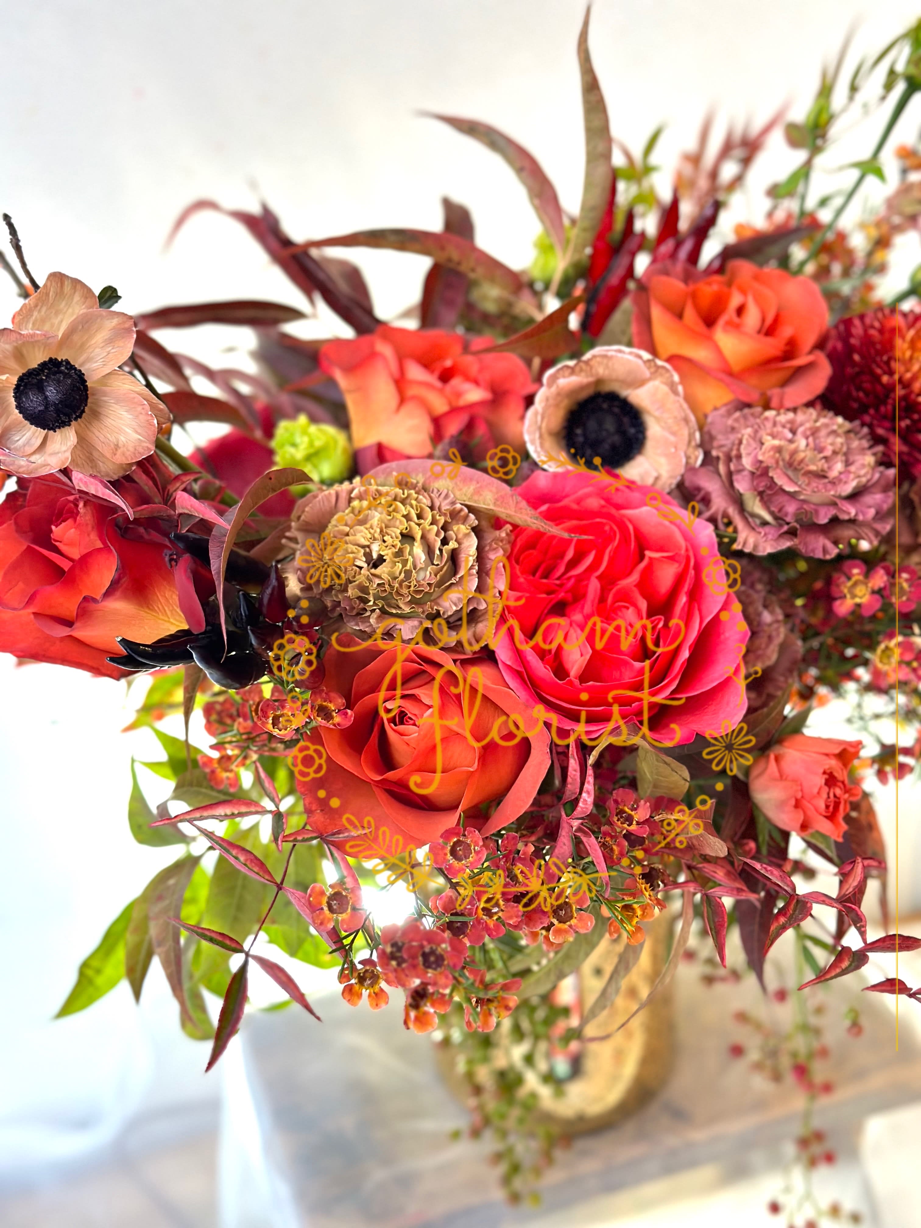  Glory - Orange tulips with seasonal dahlias.