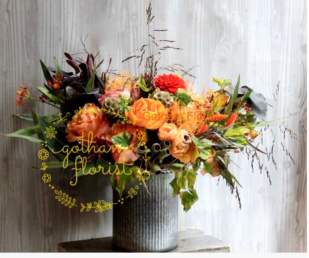 Autumn Leaves - Discover the epitome of tiktok worthy flowers with our Rustic Tin Vase Arrangement, crafted meticulously with a delightful assortment of seasonal orange and yellow blooms. Each bouquet is a unique masterpiece, varying with the season's freshest flowers to ensure you're receiving nature's finest. For those seeking an exact match to our photo, kindly give us a call to confirm availability. We offer same-day delivery service, bringing the coolest, most vibrant flowers directly to you in New York City. Elevate your floral experience with the best in NYC!   Best florist, nyc, local florist, send flowers, flower delivery, same day delivery, florist around me, flower shop, best flower shop, flowers, flower delivery, peony, peonies, same day flower delivery,  wedding florist, best florist nyc, nyc florist, florist near me, manhattan florist,  brooklyn florist  