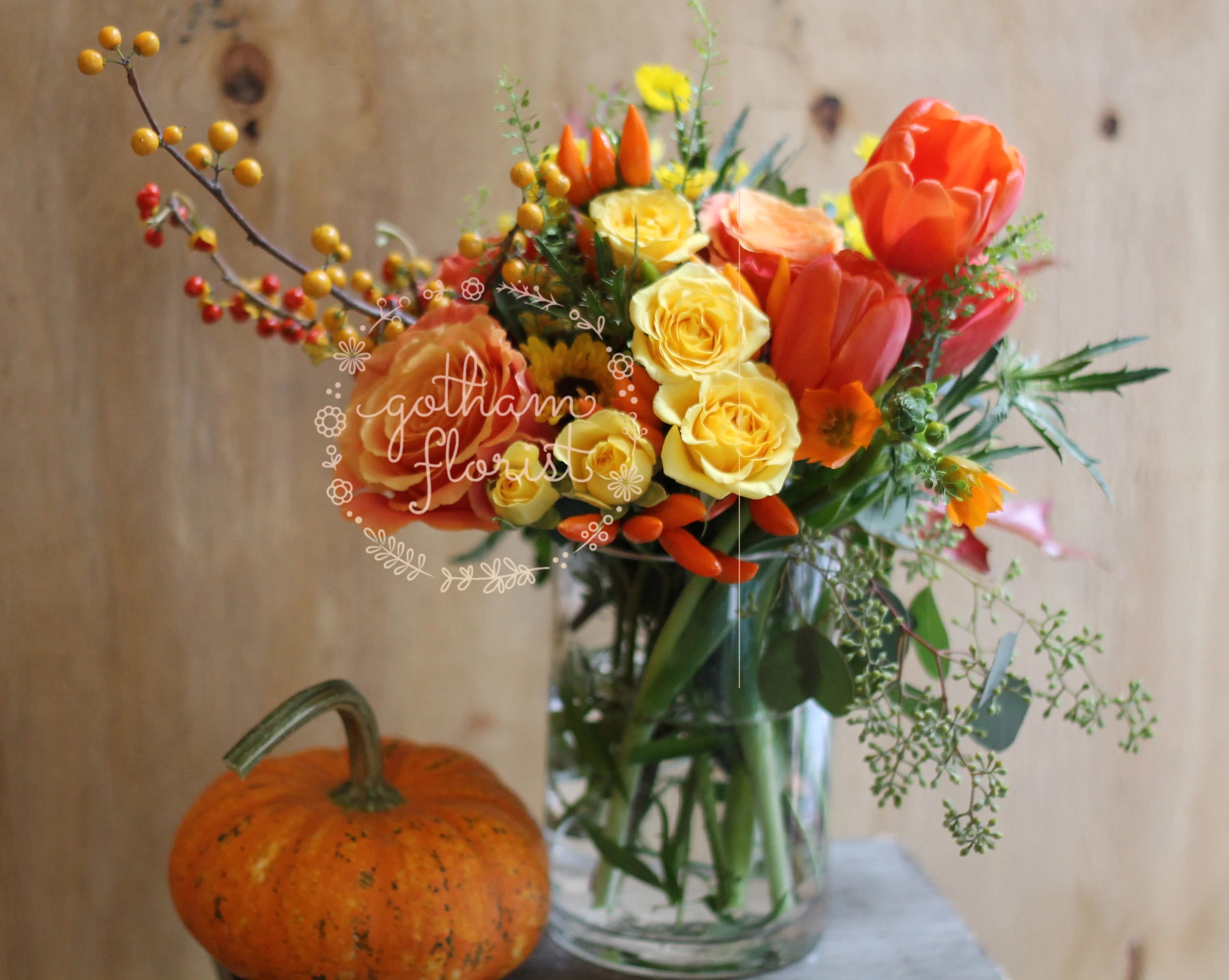 Fall Spice - Bright orange roses, yellow spray roses and mums. A cute #pumpkinspice feel. Perfect vase for a desk or nightstand. Send the cutest flowers from the best florist in new york. Same Day Delivery! #bestfloristny #bestflowersny #bestfloristnyc #bestnyflorist #bestnycflorist Pumpkin NOT included.