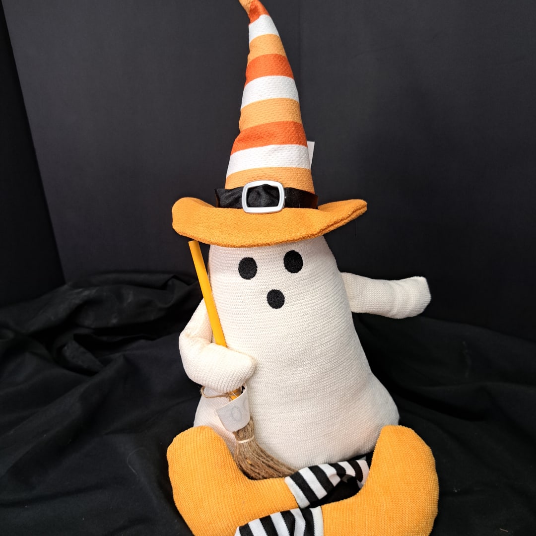Halloween ghost plush wearing a striped witch hat and holding a broom