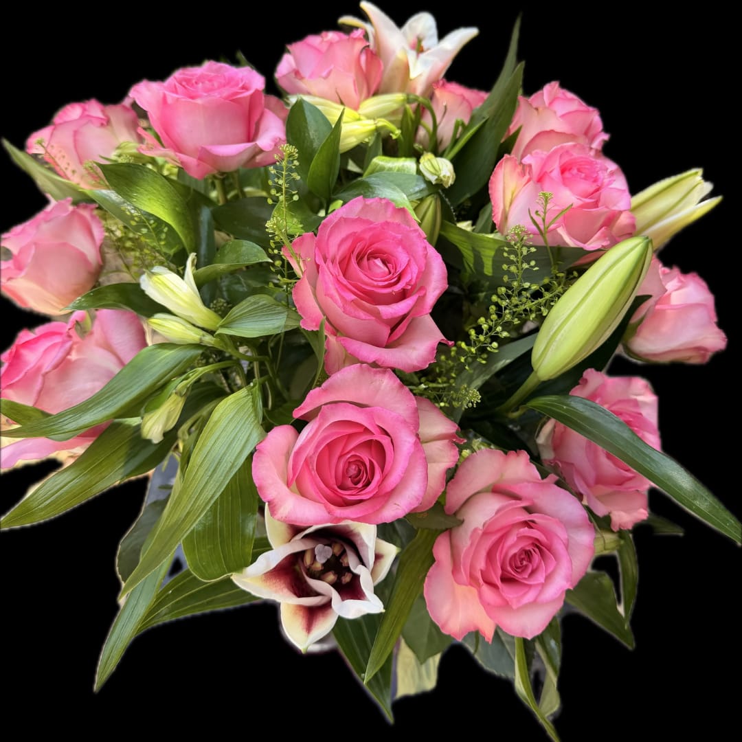 Bouquet of pink roses with lilies and greenery