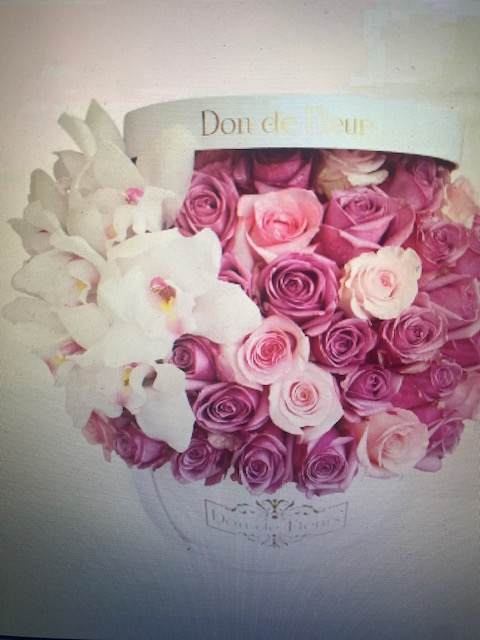 deluxe flower box  - roses in a elegant box hat with orchid it can be done yellow  and red 