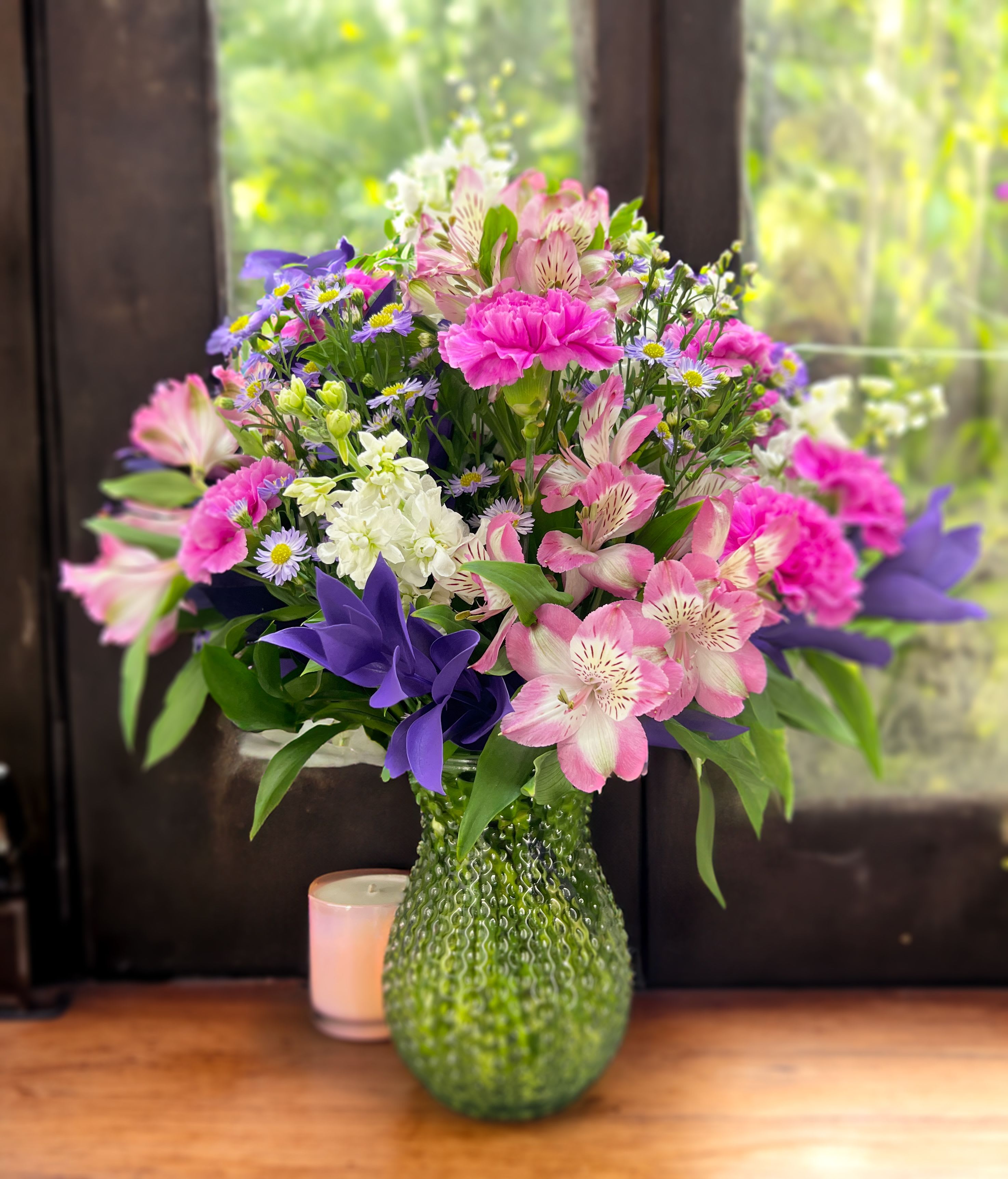 You're on my mind - This bouquet will surprise with its' size! Composed of alstroemeria, dianthus, and stock.