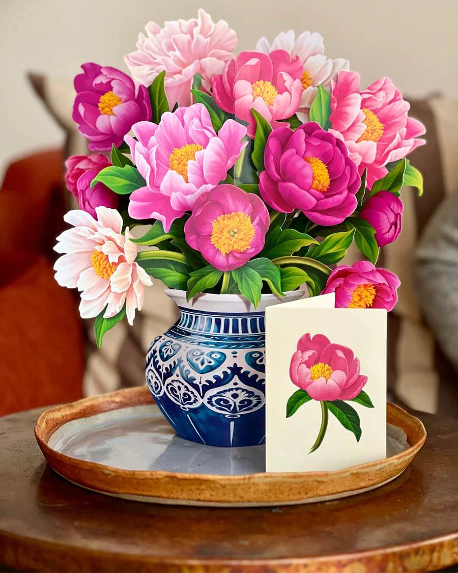Peony Paradise Fresh Cut Paper Pop-Up Bouquet - Stunning paper floral bouquet pops open and brings color to any room. Note: card included- handwritten message upon request. No watering needed. Send some love!