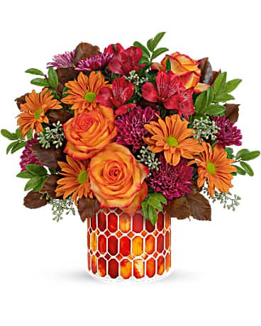 Teleflora's Resplendent Fall Bouquet - Blooming with breathtaking fall hues, this radiant autumnal rose bouquet makes an unforgettable fall gift when presented in this shimmering stained glass mosaic vase. Orange bi-color roses, purple cushion spray chrysanthemums, bronze daisy spray chrysanthemums, red alstroemeria and brown copper beech are arranged with huckleberry and seeded eucalyptus. Delivered in an Autumn Radiance Mosaic vase.