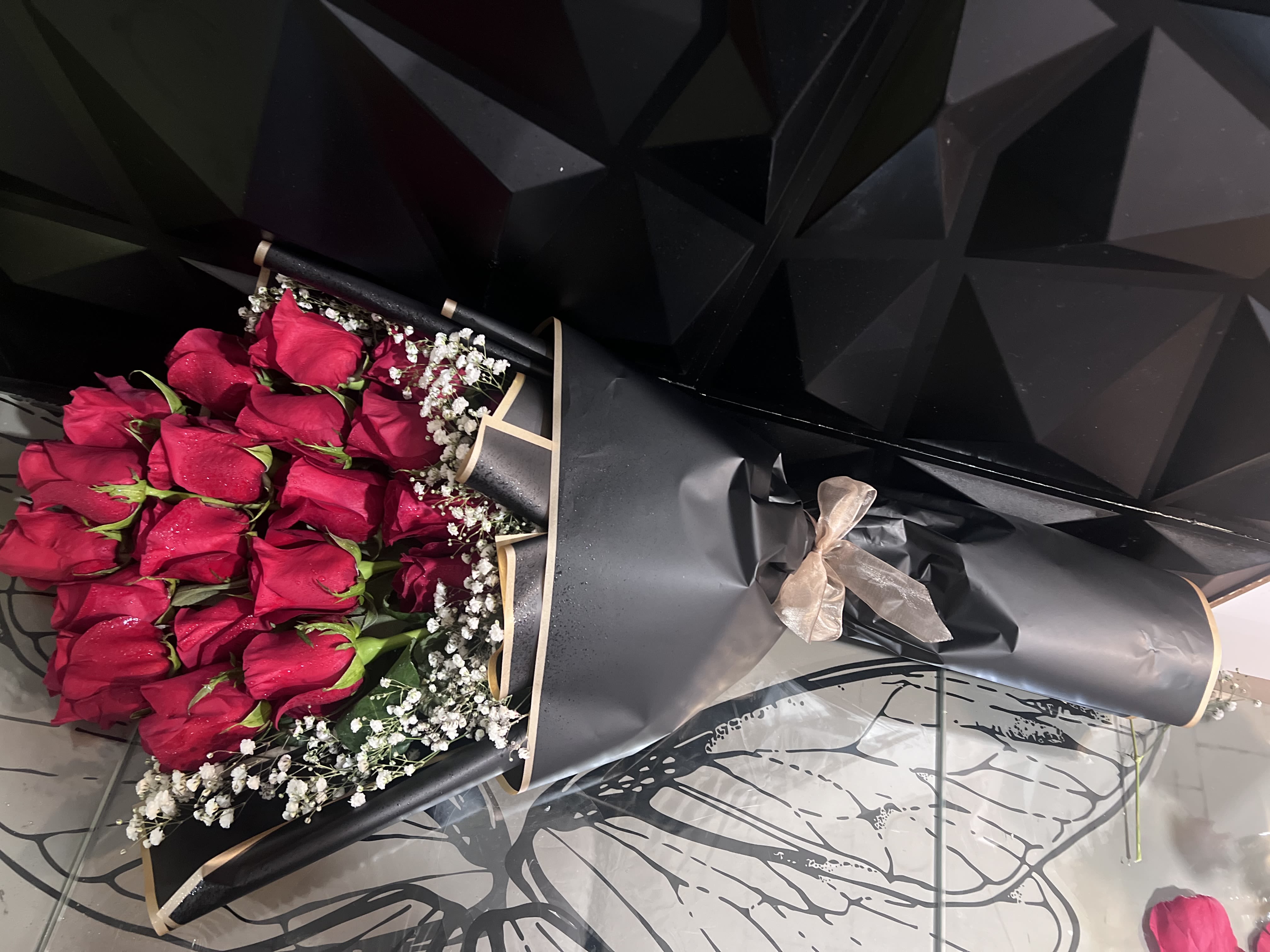 Bouquet of roses - Red rose available in different options Standard 12 stems of roses ,Deluxe 18 red stems red roses ,Premium 24 stems of red roses .