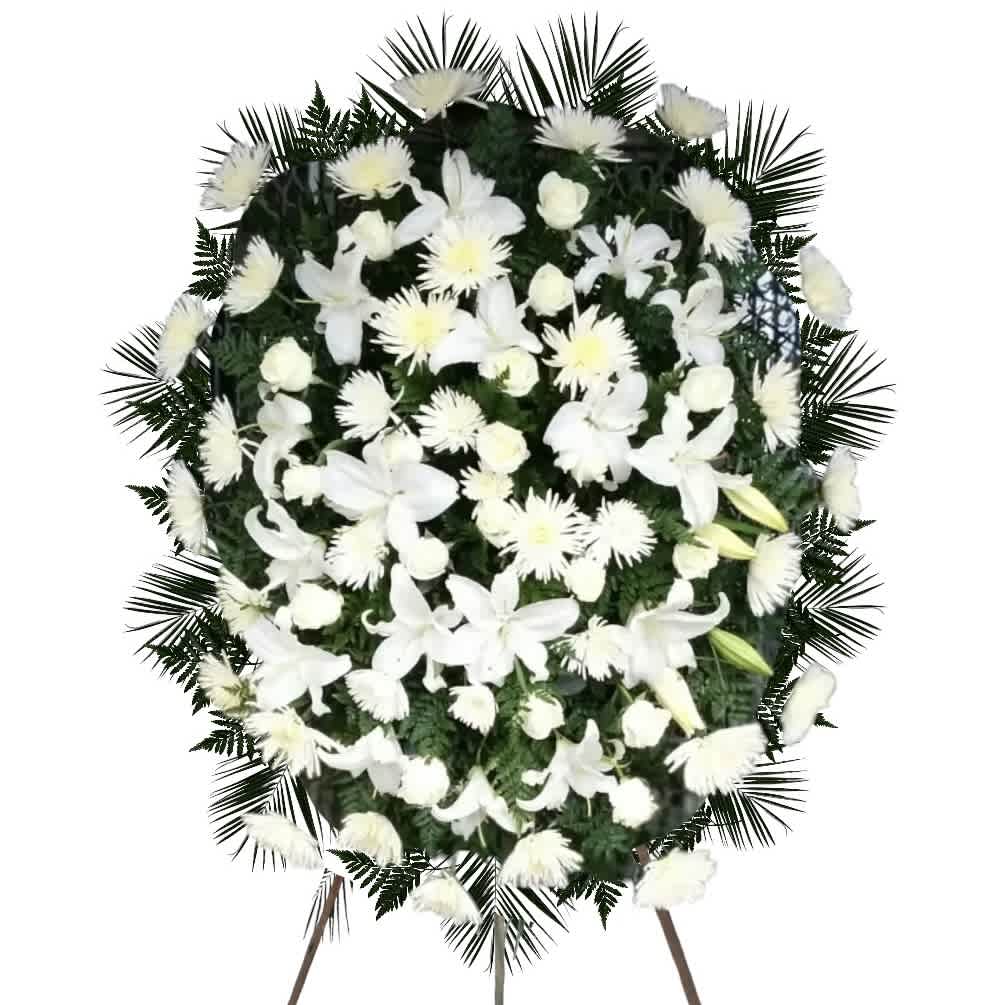 White floral standing spray on an easel