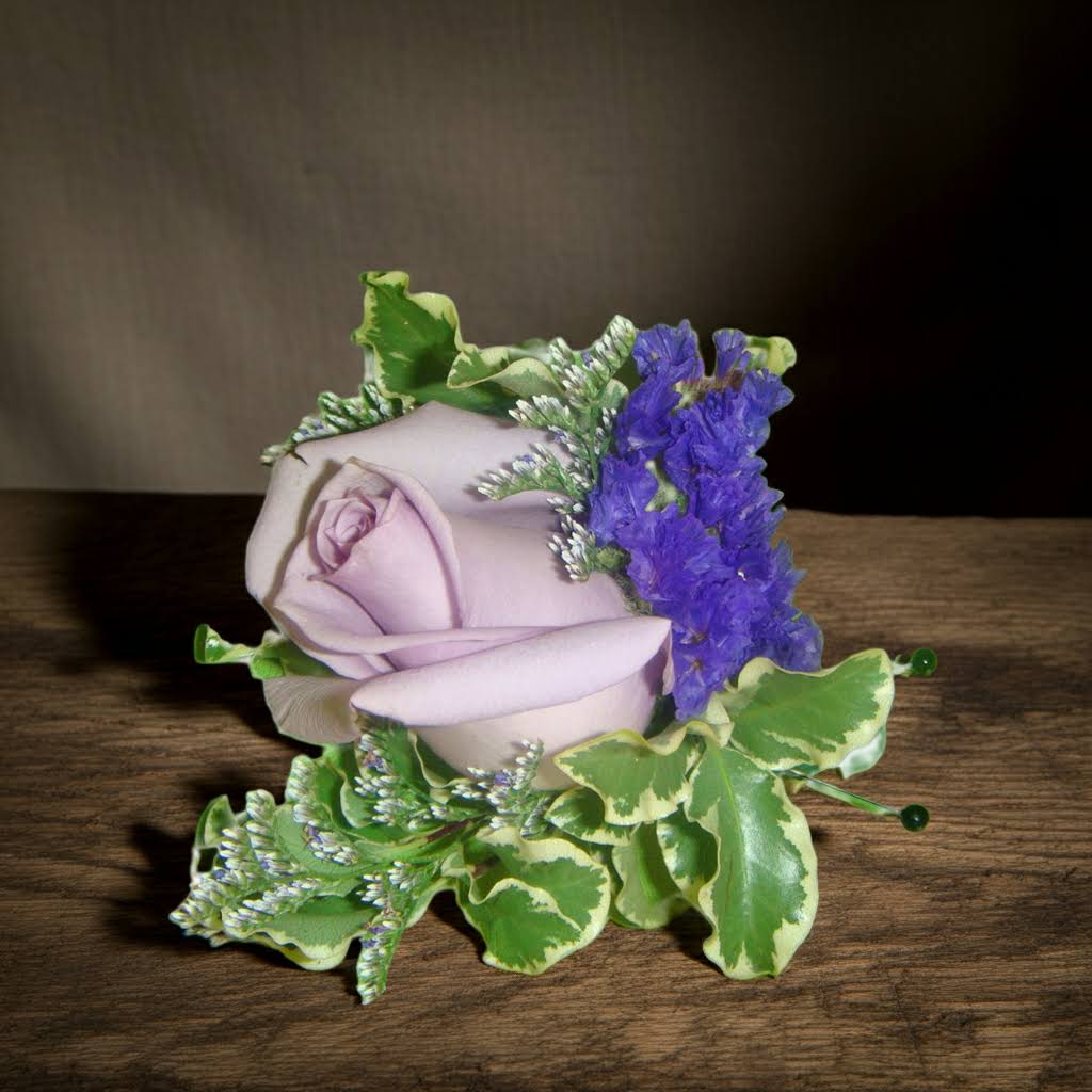 Lavender rose with purple filler and variegated greenery