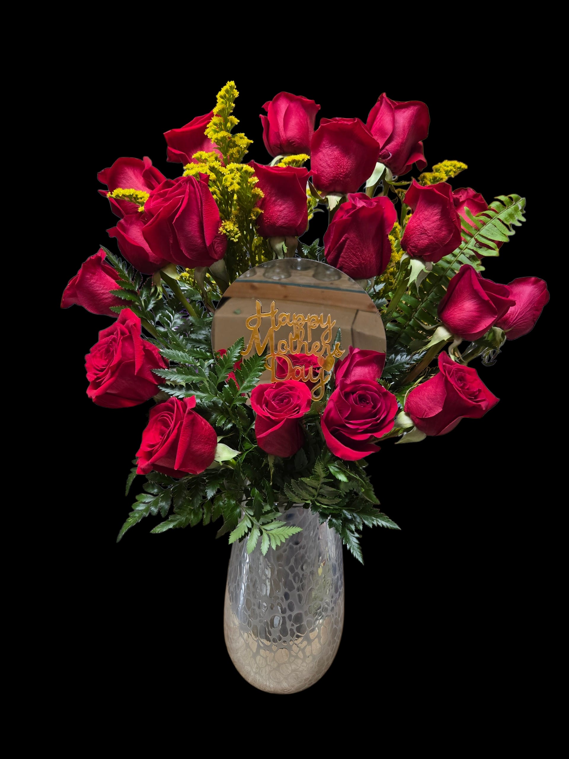 Camelia Stone - Dense cluster of deep red roses with yellow filler, green foliage in a white stone vase plus Mother's Day sign