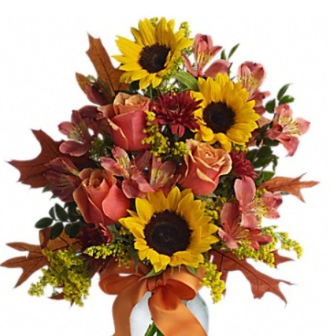 Bouquet with sunflowers, roses, and pink alstroemeria in warm autumn colors