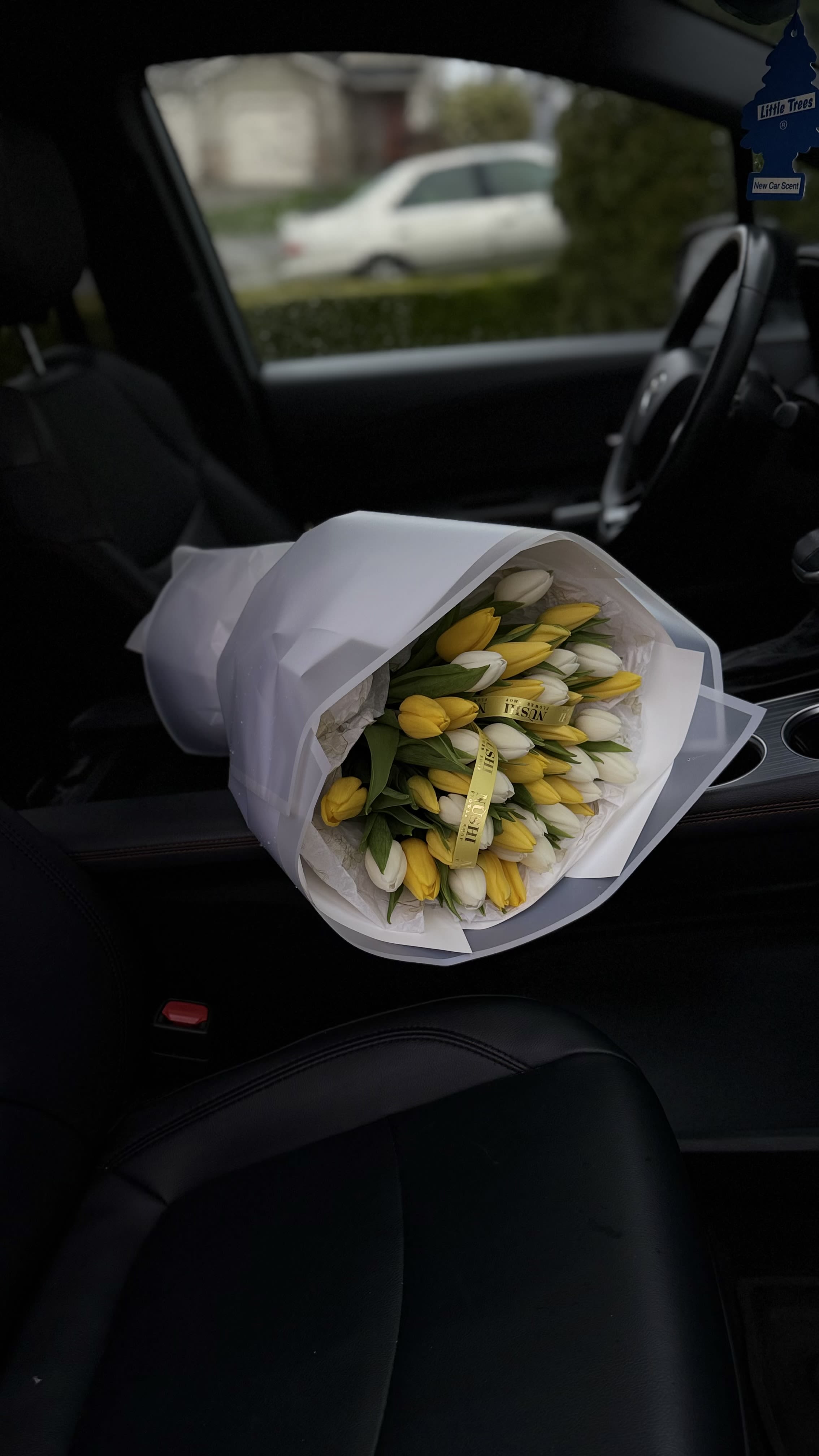 Lemon Cream  - Lemon Cream is a fresh and delicate bouquet of white and soft yellow tulips, beautifully wrapped in elegant packaging. Light, airy, and full of spring mood, this bouquet is perfect for brightening someone’s day.