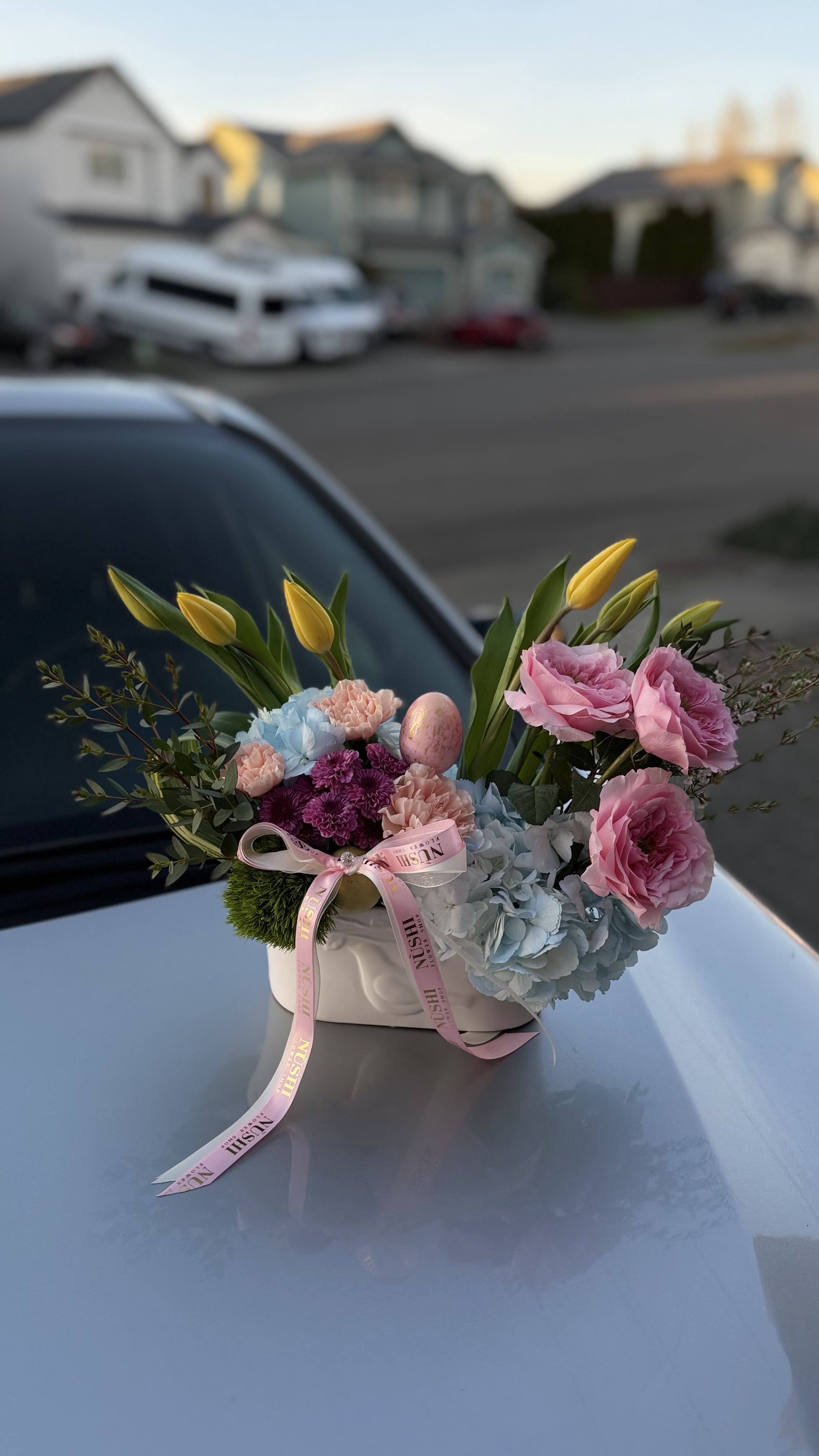 Easter Morning - Easter Morning is a soft pastel floral arrangement in a basket and vase, inspired by the freshness of spring and the gentle beauty of Easter.”