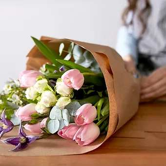 Florist Choice cut bouquet - Mixed bouquet of pinks, white and reds, tastfully created for that special someone. Hand tied. Vase not included.