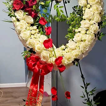 Standing Rose Heart - 24 inch standing heart is designed with standard high quality roses and spray roses, colors and custom elements can be designed but please call for pricing. Requires 48 hour advance notice to prepare.