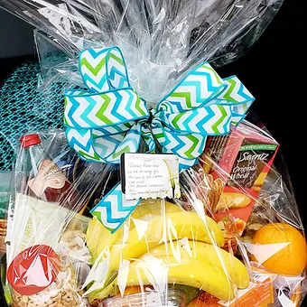 Fruit &amp; Snack Basket - A large helping of seasonal fruit, nuts, jam, cheese, pasta and sauce, cookies and crackers.