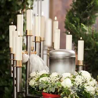 Memorial table floral spray - Please accept our condlences on your loss.  Elegant Petals memorial designs are created with the client in mind. Please contact us to personalize the memorial to the preference of your loved one.  Price may vary base on the desired floral design.