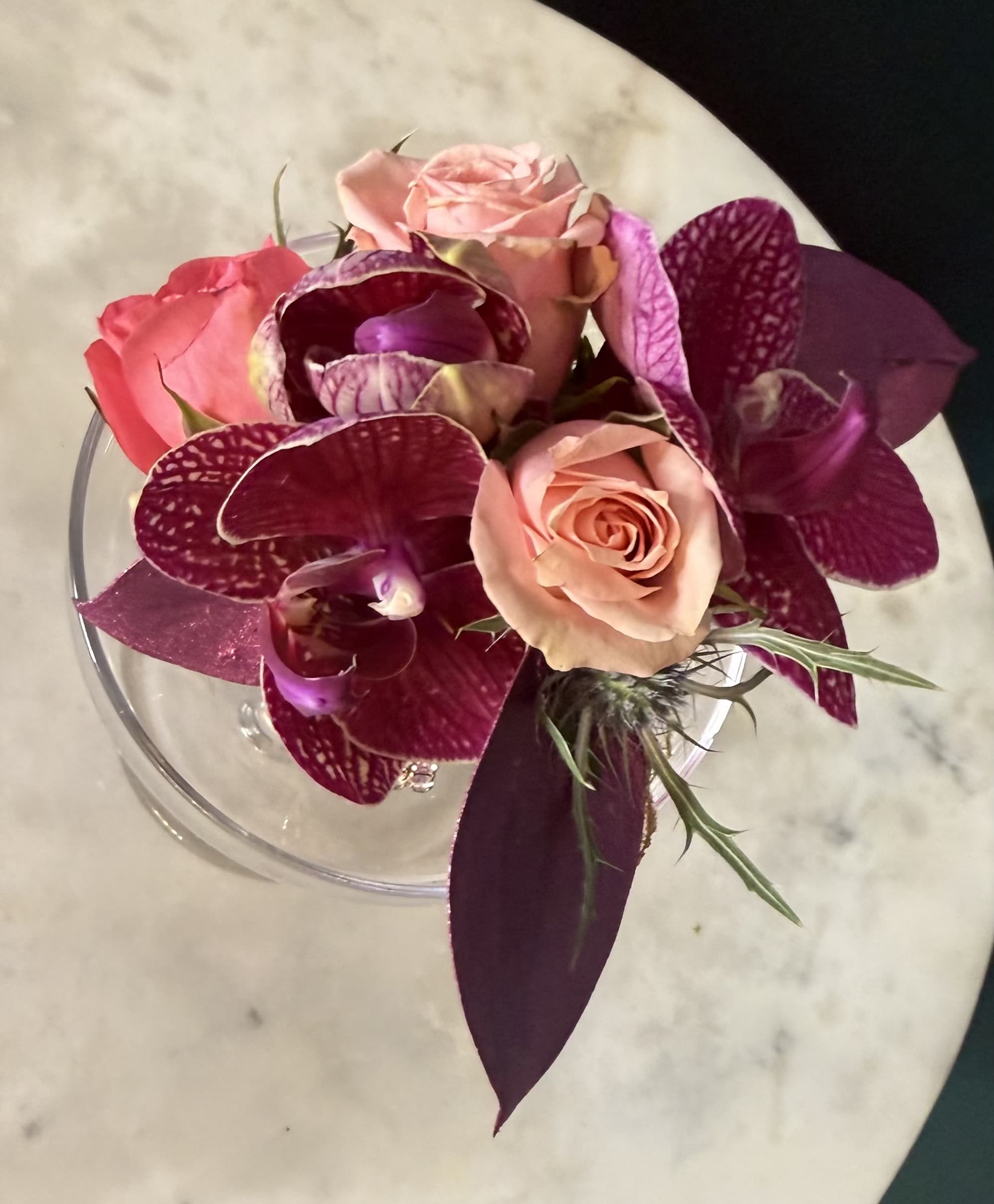 Orchid Cuff Corsage by Evergreen Elegance  - Choosing between a gold or silver cuff for a corsage depends on your   skin tone, dress color, and the vibe you want to achieve. Gold generally offers a warm, traditional, and romantic feel, while silver provides a sleek, modern, and cool-toned aesthetic.