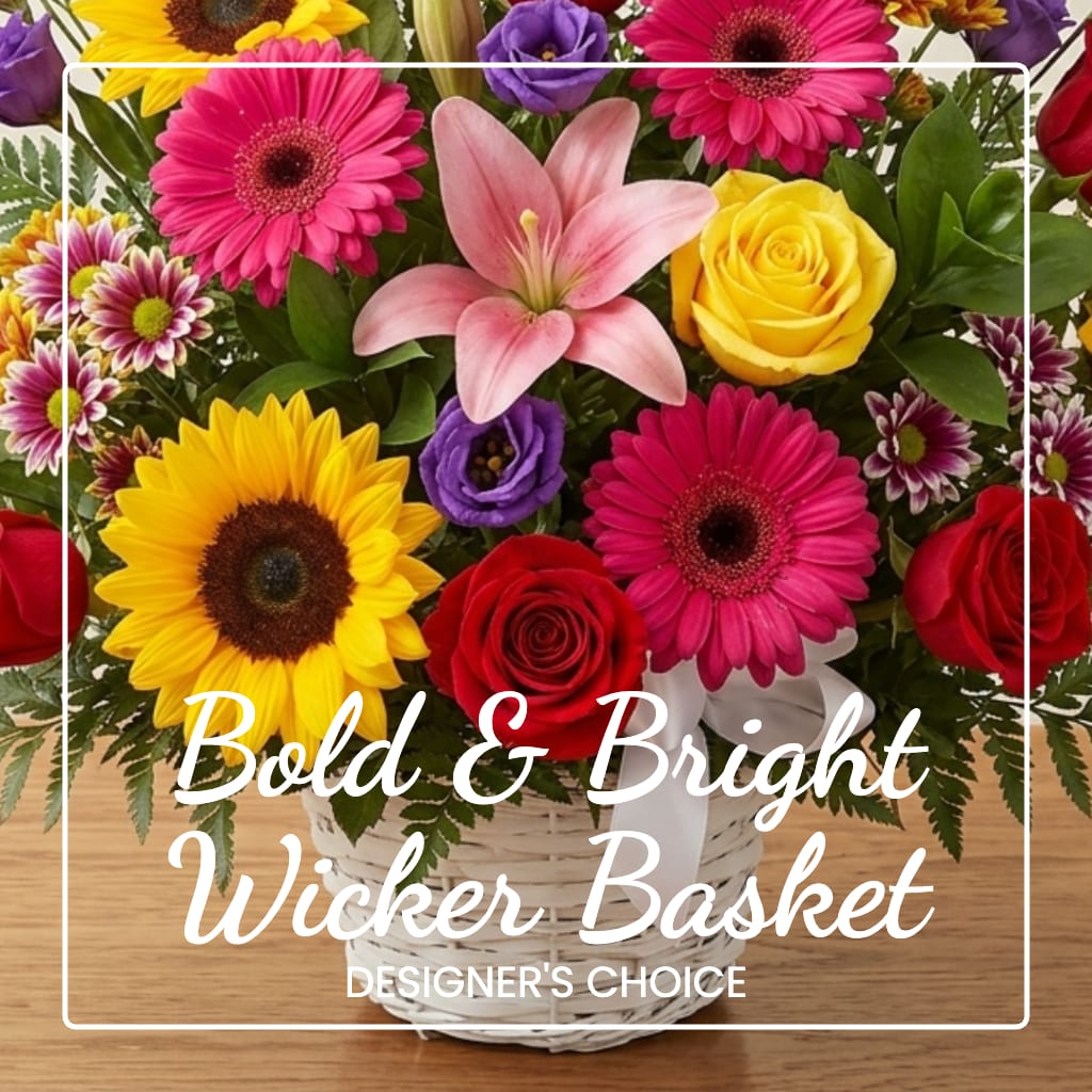 Bright mixed flower basket with sunflowers, roses, gerbera daisies, and a pink lily