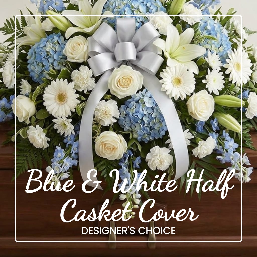 Blue and white floral casket cover with a silver bow