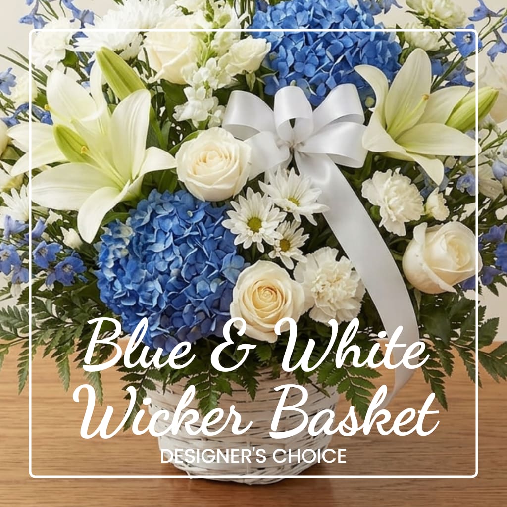 Blue and white flower basket with lilies, roses, and hydrangeas