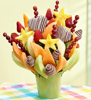 That's My Baby - Product ID: 102326  Baby, babyâcelebrate the newest addition to the family with a gift that every new Mom and Dad will love. Juicy strawberries dipped in milk chocolate with white swirls, honeydew melon and cantaloupe wedges, pineapples shaped like small stars and more offer the perfect pick-me-up for the new Mom and Dad Fruit is picked at the peak of freshness Hand-crafted and designed by local florists Arrives in a reusable green tin vase that complements any nursery dÃ©cor; measures 4.75"H Delivered fresh to their door with Same-Day Delivery Available in Large: measures 18"H x 15"W Allergy Warning: Fruit Bouquets products may contain peanuts and/or tree nuts. We recommend that you take the necessary precautions based on any related allergies.
