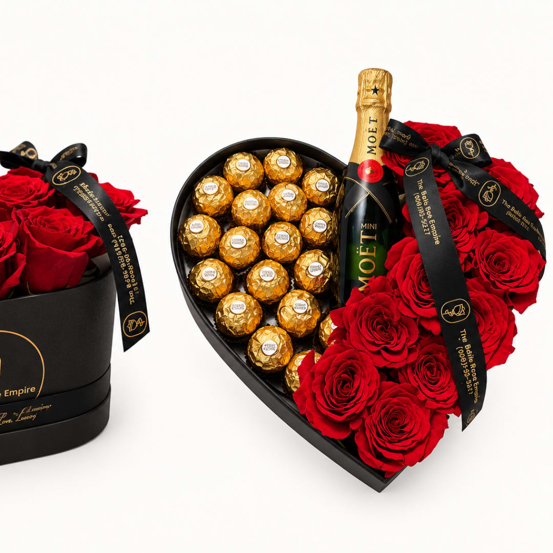 Heart-shaped box with red roses, champagne, and gold chocolates