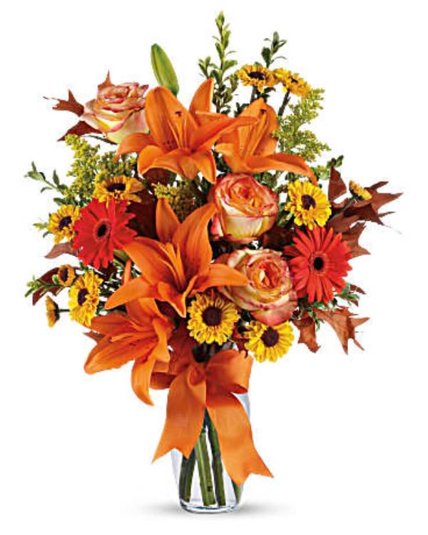Burst of Autumn - Feel the crisp beauty of fall with this wonderful bouquet. This luscious arrangement is filled with a gorgeous assortment of autumnal hues, sure to delight your recipient with this dazzling array of rich colors and textures. 