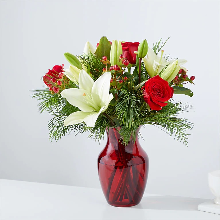 EVERGREEN DELIGHT BOUQUET - EVERGREEN DELIGHT BOUQUET Inspired by the lush greenery and timeless charm of evergreen trees, this wintry mix creates a classic and sophisticated color palette that is perfect for any occasion.  