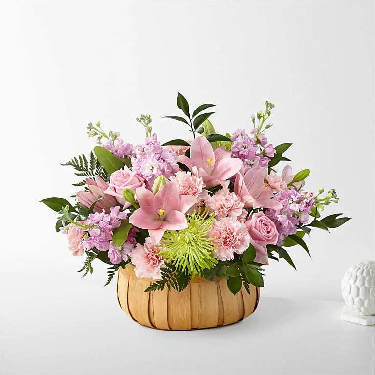 Beautiful Spirit Basket - Beautiful Spirit Basket Let them know how much you care with a gorgeous bouquet that features carnations, stock, roses, lilies and Fuji mums. Each bloom is a thoughtful reminder of your support and love, while sitting in a beautifully crafted basket.
