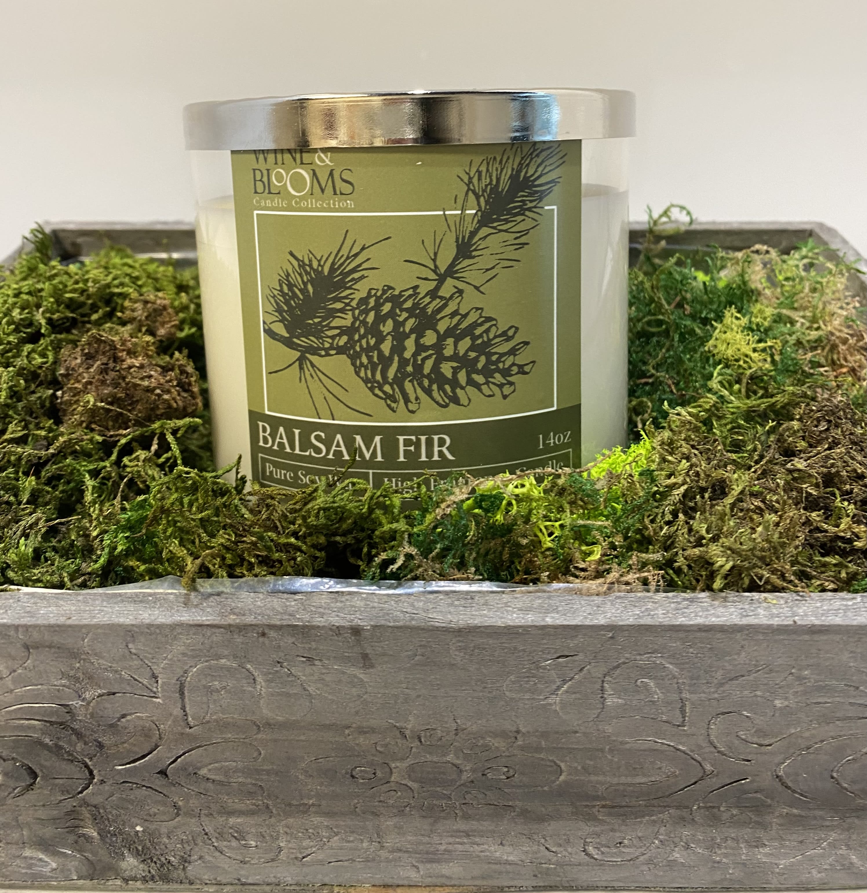 Balsam fir candle in a decorative wooden box with moss
