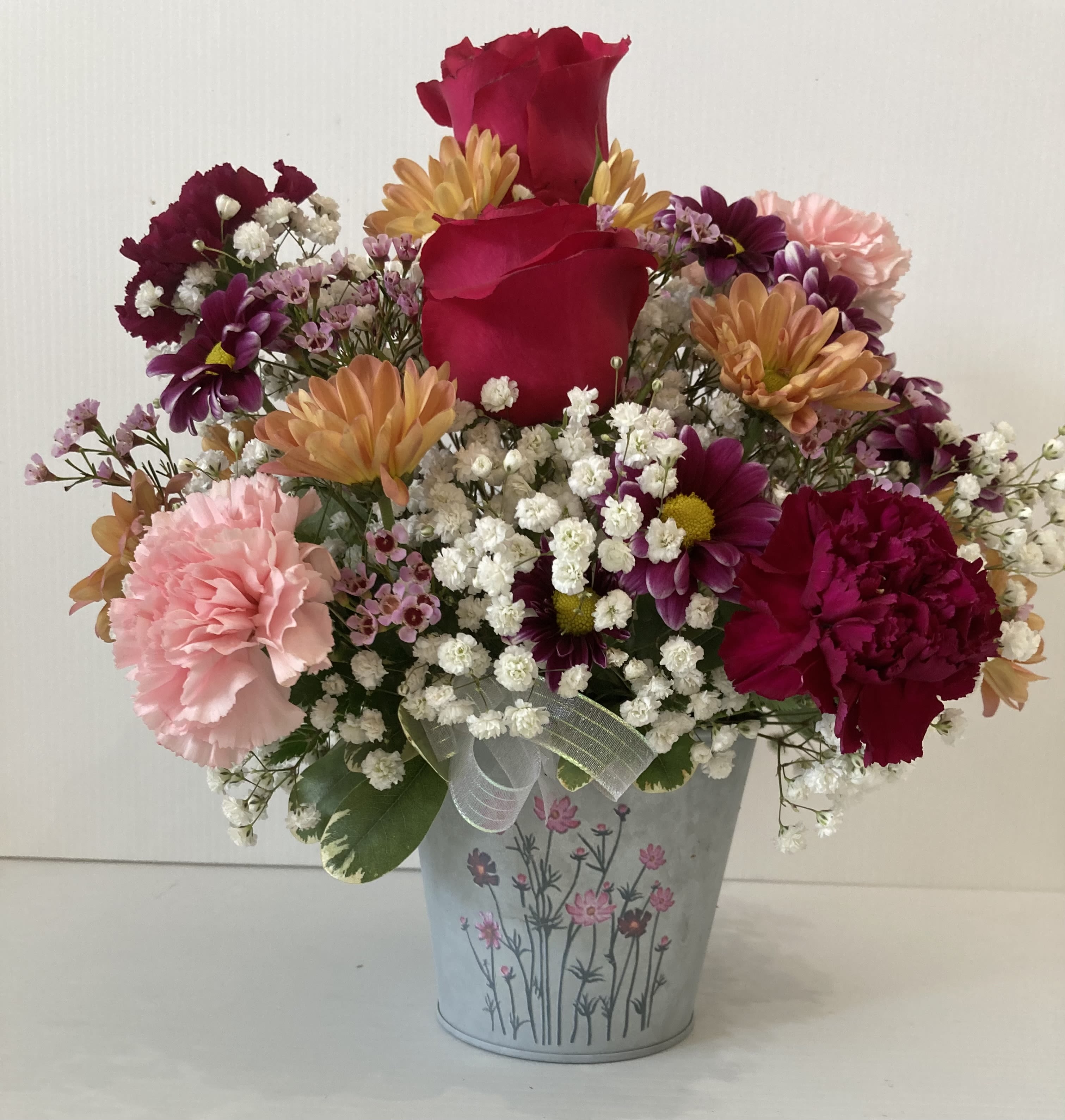 For you - Arrangement includes roses, lilies, carnations,  daisy, filler and assorted greenery