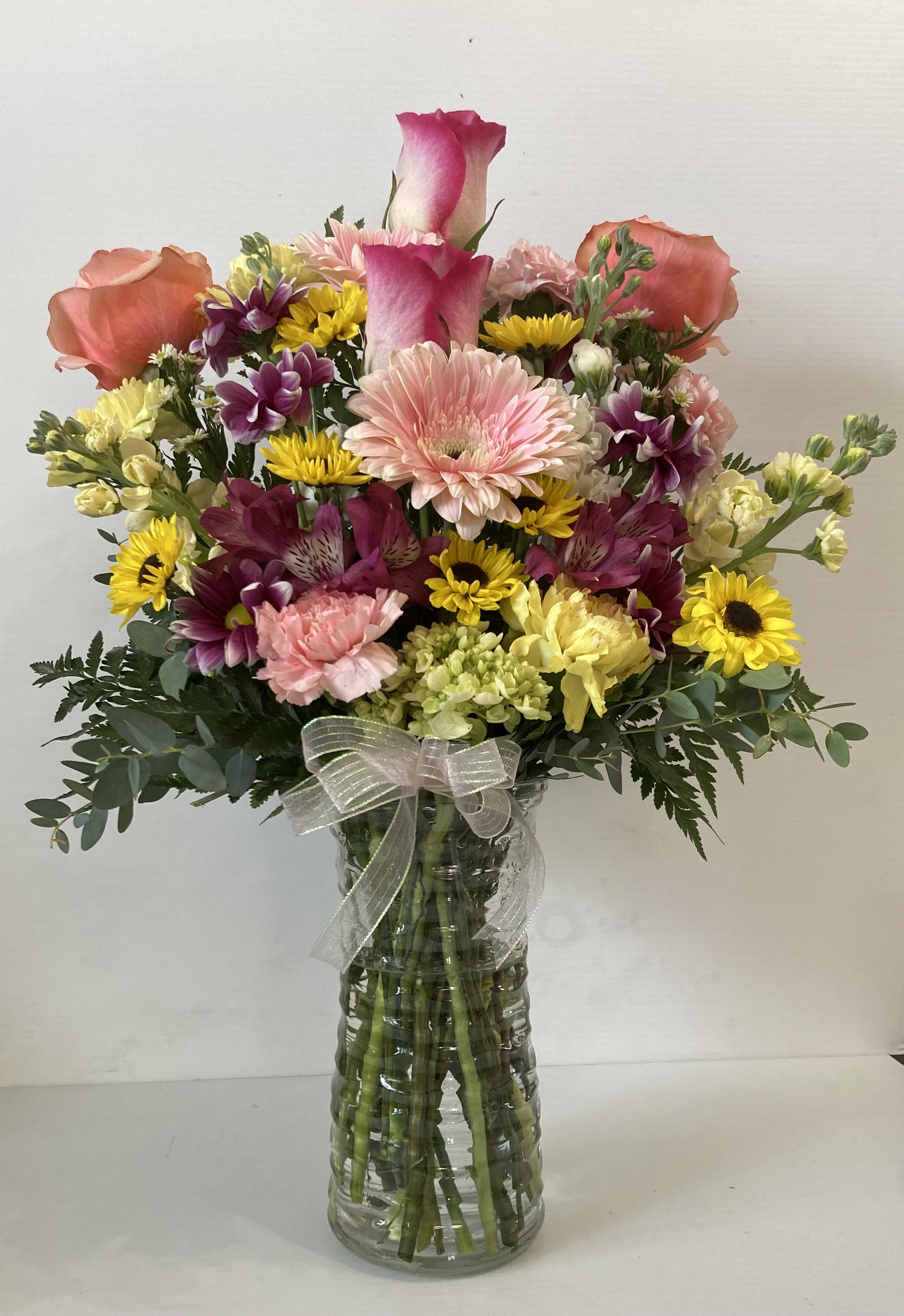 Springtime - Arrangement includes roses, lilies, carnations, hydrangea, gerber daisy, filler and assorted greenery