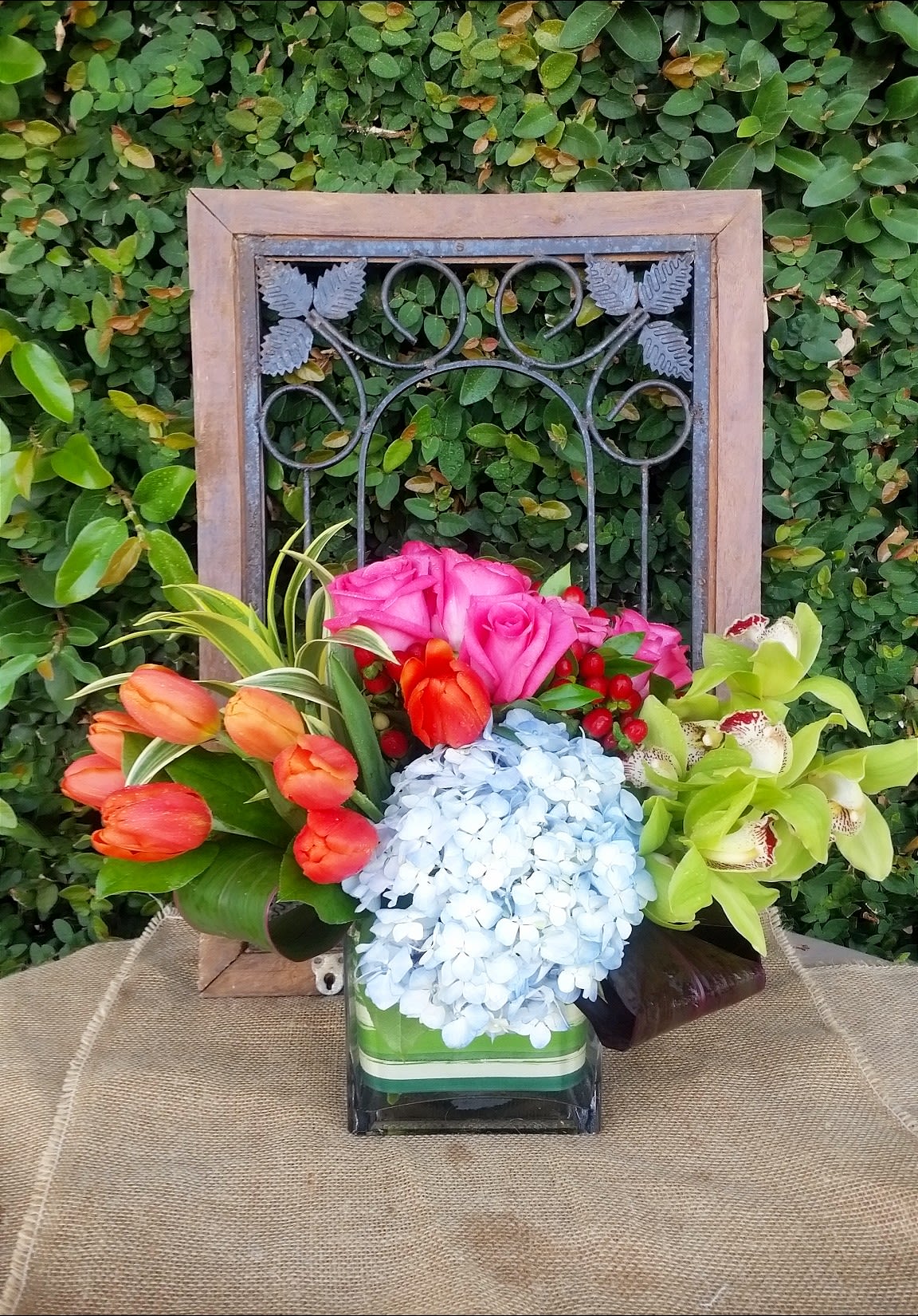 Lavish &amp; Lush - Vibrant and uplifting cheerful colors create this full design that is modern clean and elegant. Tulips, Orchid, Roses and Hydrangea