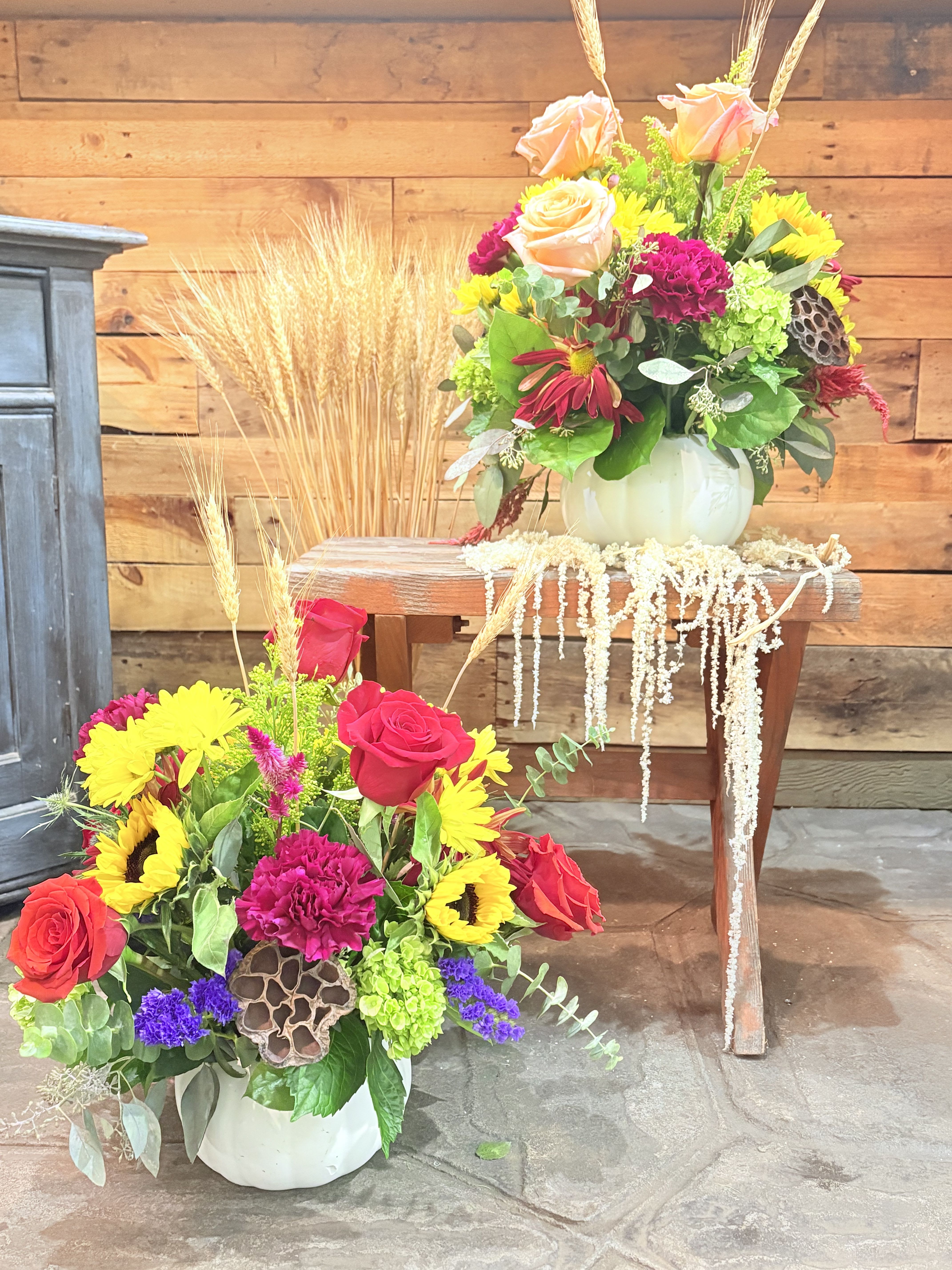 White Fall Pumpkin - Celebrate fall with this bright and bold design designers choice! We use a mixture of local and imported blooms to create an impact in this versatile vase arrangement. (**Colors and flower varieties may vary)
