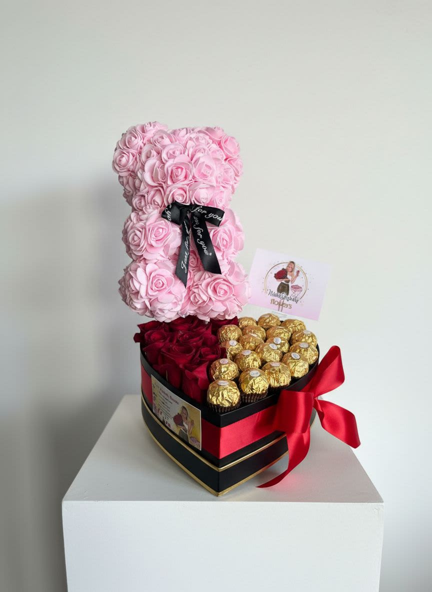 Pink rose teddy bear with red roses and gold chocolates in a heart-shaped box