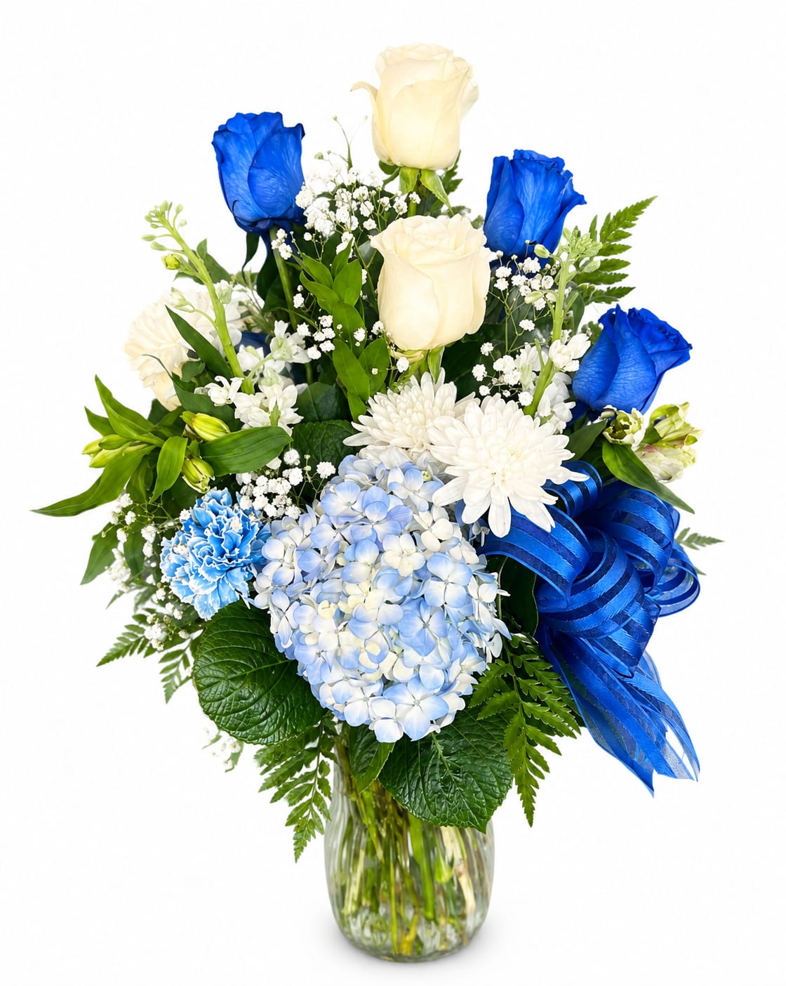 Blue and white flower arrangement in a glass vase with a ribbon