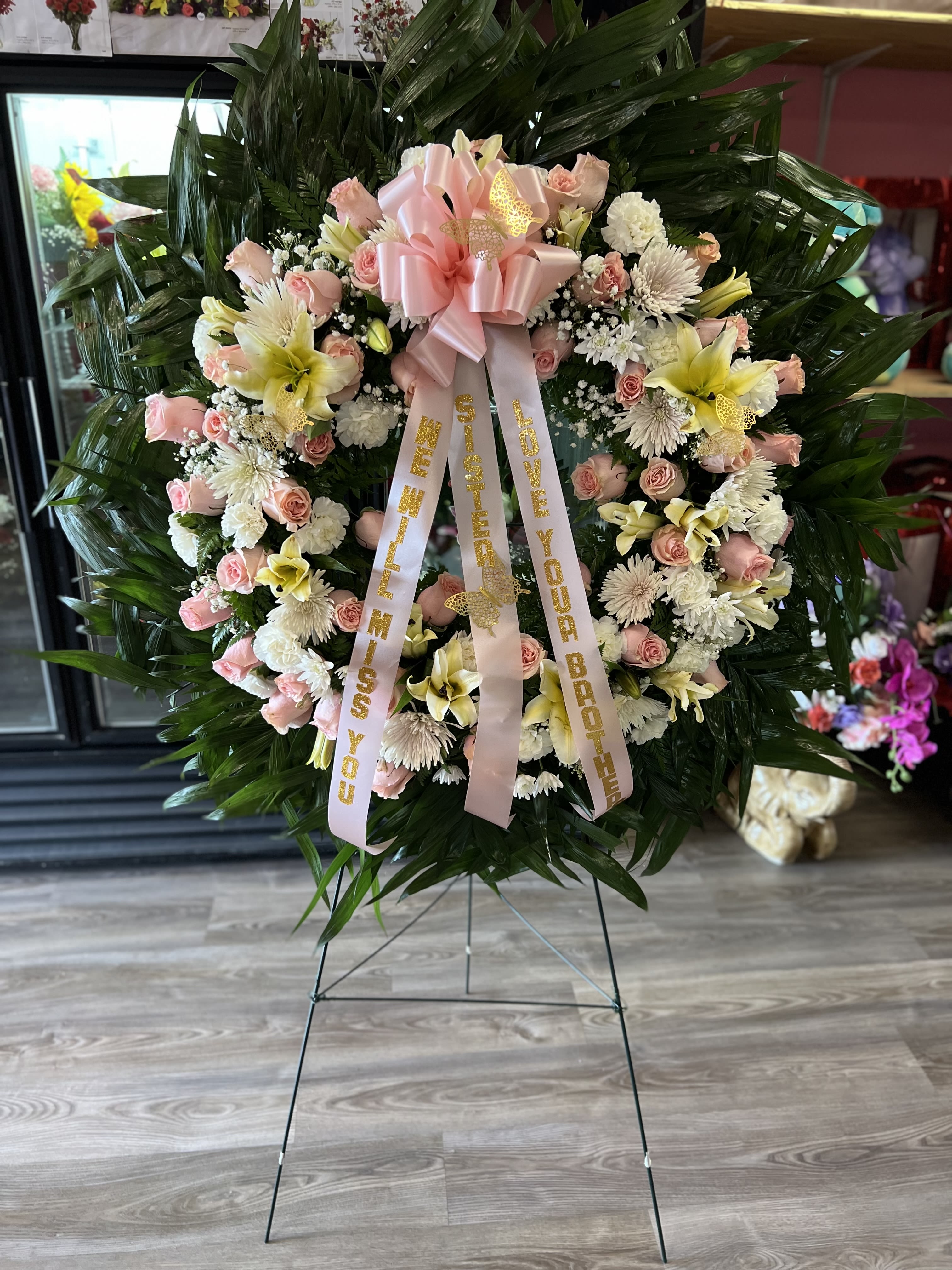 Pink and white Easel - 25 roses white and pink Lilys carnations 