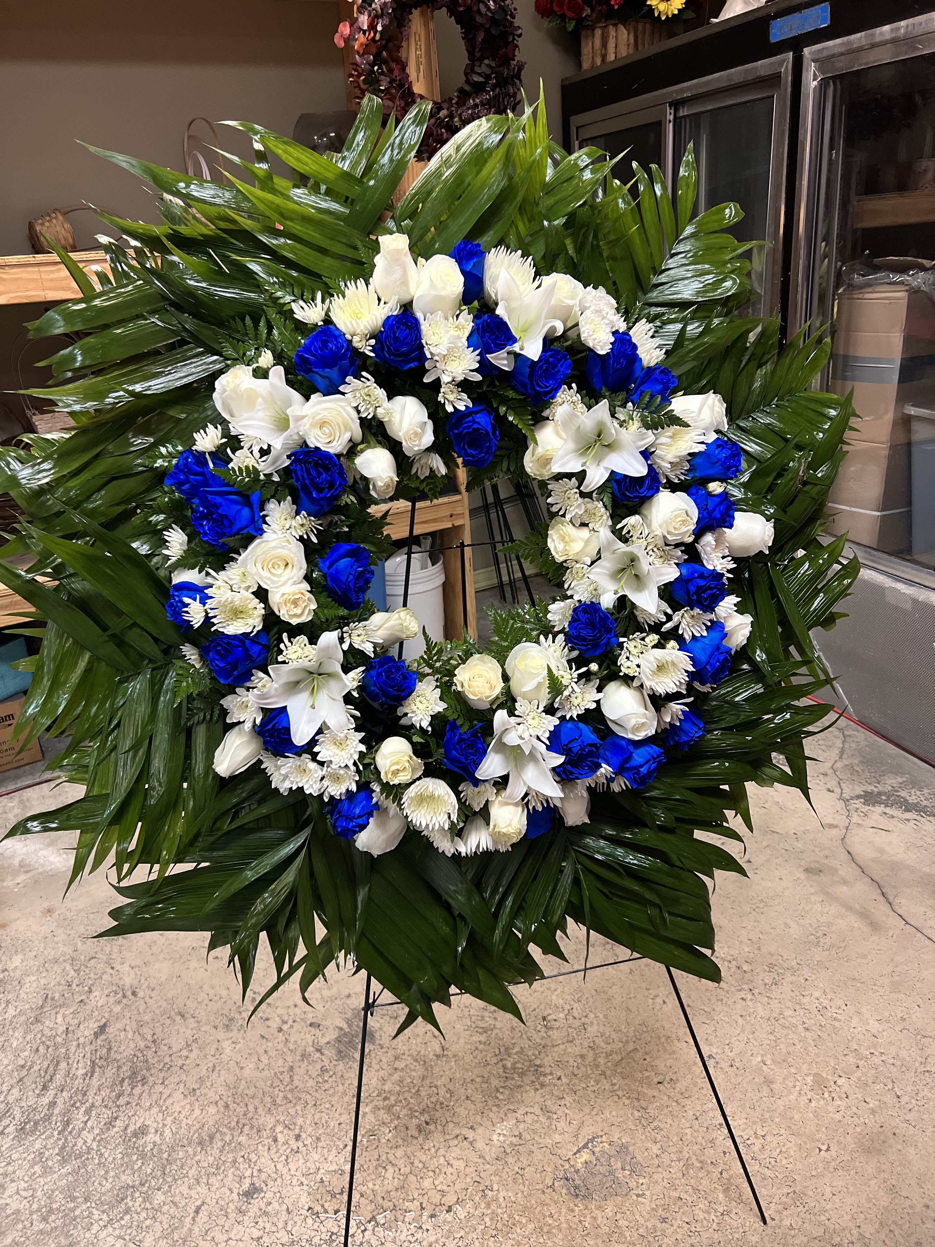  White &amp; blue sympathy wreath  - , white, and blue sympathy wreath} Medium Mixture of Roses, carnations, and lilies with filler green