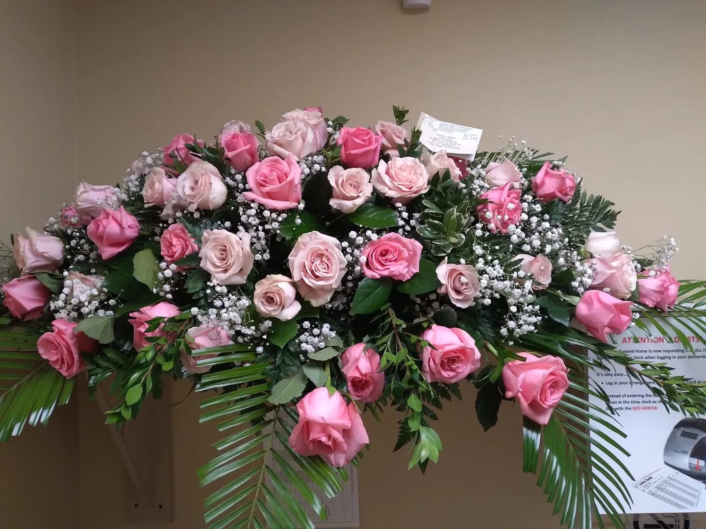 Large pink rose spray with baby's breath and greenery