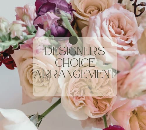 Pastel bouquet of roses and mixed blooms with a designer's choice label