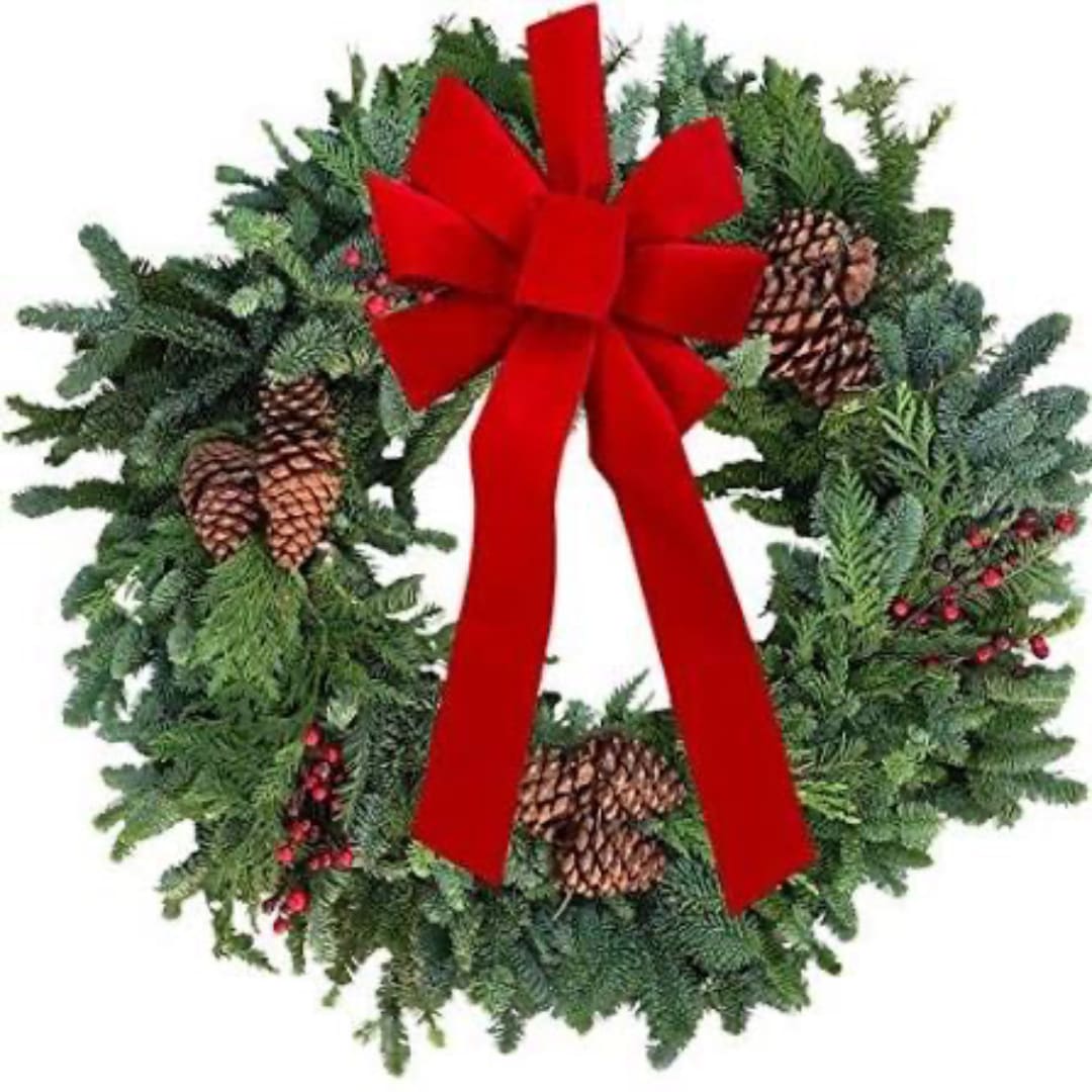 Christmas wreath with pinecones and a red bow