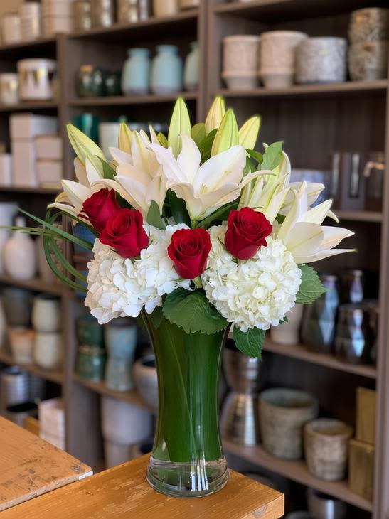 Pure In Red by Willow Garden  - An elegant composition of white lilies, roses, and hydrangea, creating a timeless yet modern look.