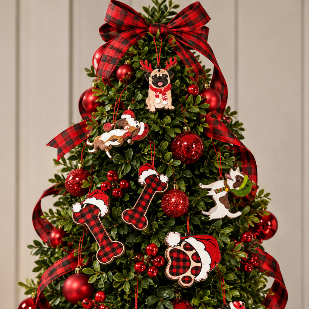 Decorated Christmas tree with red ornaments, plaid ribbon, and dog ornaments