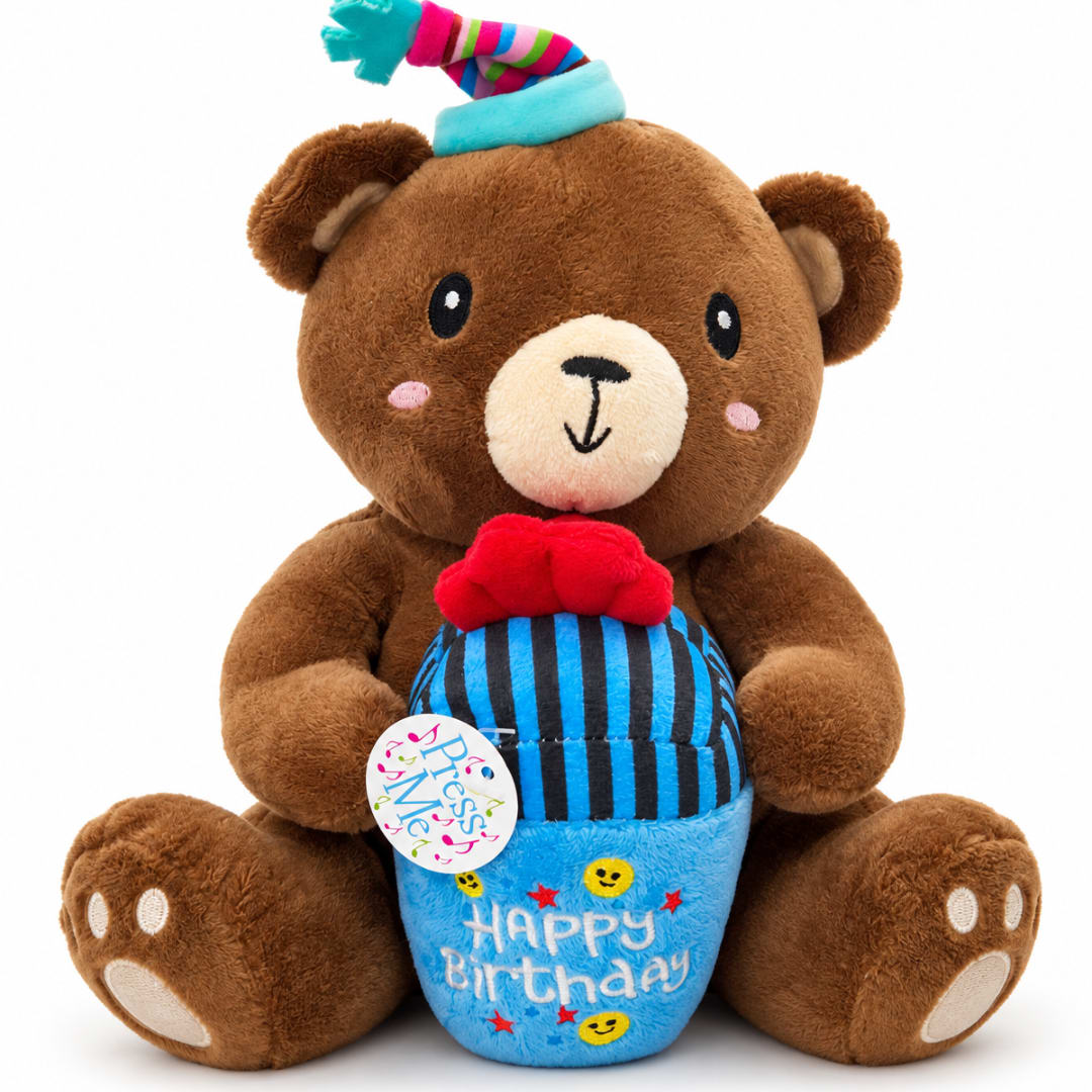 Brown teddy bear holding a birthday cupcake plush with a party hat