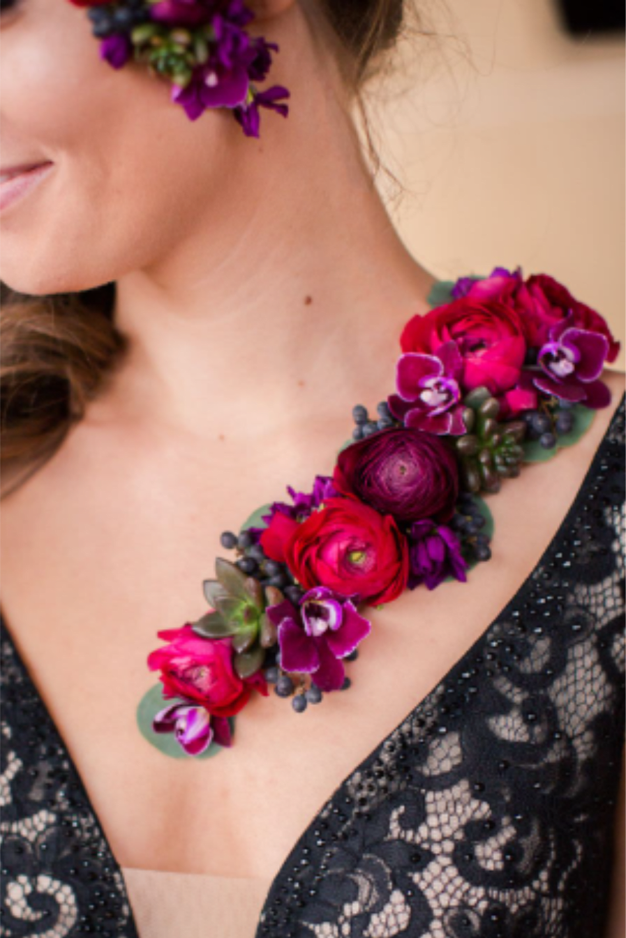 Midnight Bloom Wearable Corsage - A striking wearable floral piece featuring rich crimson and magenta blooms, layered with delicate orchids, berries, and textured succulents.