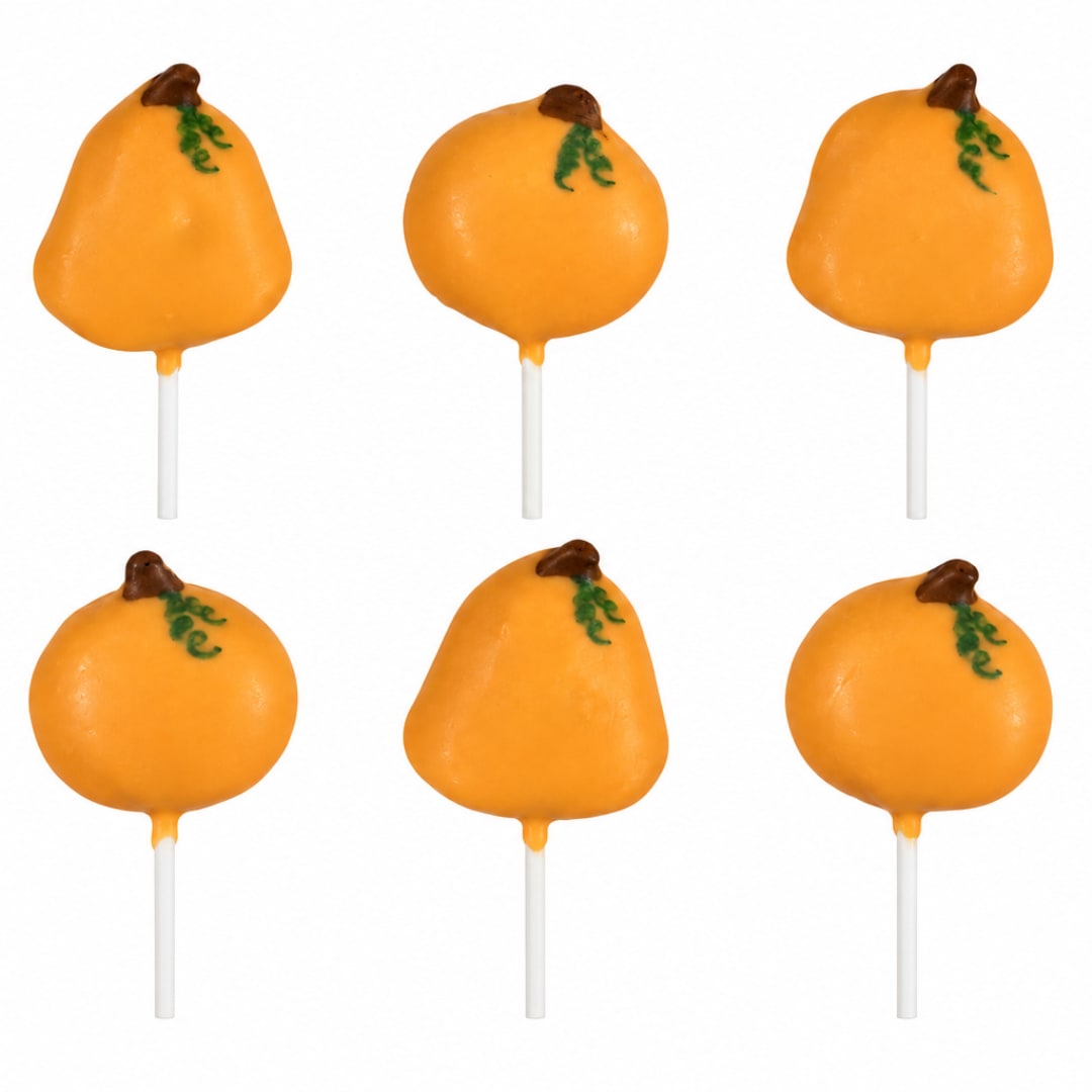 Six orange pumpkin-shaped cake pops on white sticks